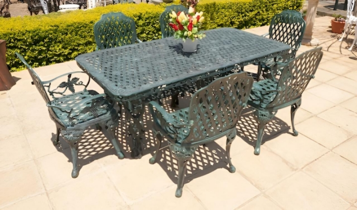 King Grape - Six green chairs with armrests and a green rectangular table. Made by GardenFurn Africa